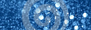 Blue sparkling glitter bokeh background banner