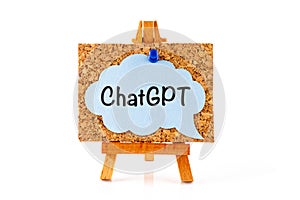 A blue speech bubble with word ChatGPT on a corkboard on a wooden easel photo