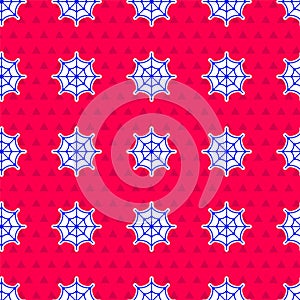 Blue Spider web icon isolated seamless pattern on red background. Cobweb sign. Happy Halloween party. Vector