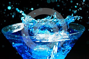 Blue splashing cocktail