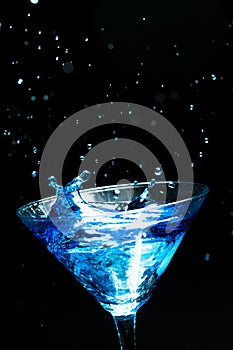 Blue splashing cocktail