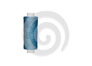 blue spool of sewing thread isolated on white background