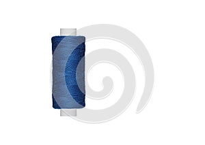 blue spool of sewing thread isolated on white background