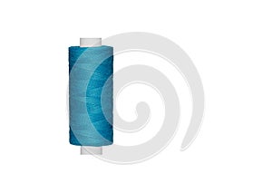 blue spool of sewing thread isolated on white background