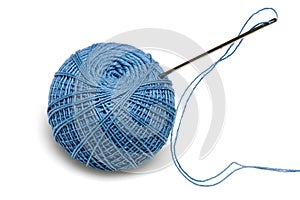 Blue spool of the threads with needle