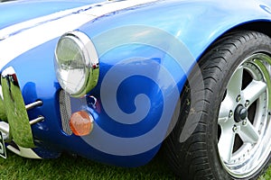 Blue sports car fender