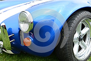 Blue sports car fender photo