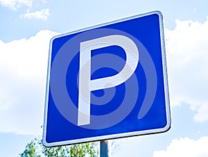 Blue square parking lot sign