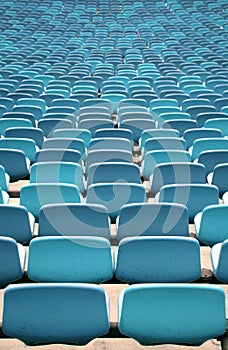 Blue Stadium seating in rows from behind