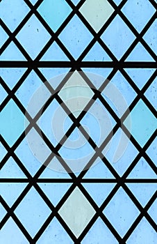 Blue stained glass window diamond pattern