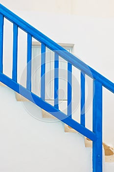 Blue staircase with railing