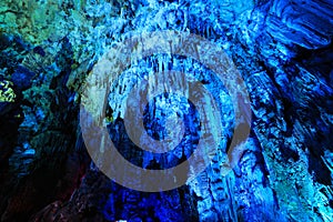 Blue stalactites in cave