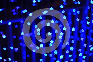 Blue star shape light bokeh background
