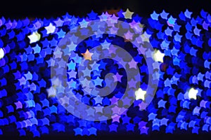 Blue star shape light bokeh background