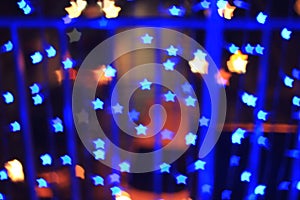 Blue star shape light bokeh background