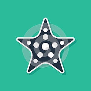 Blue Starfish icon isolated on green background. Vector