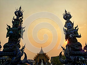 Blue Statue at Rong Sue Ten temple chaing rai in evening