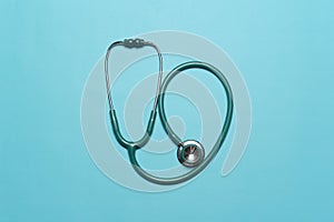 Blue Stethoscope against blue background