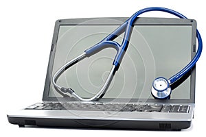 Blue stethoscope and laptop