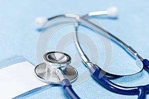 Blue stethoscope medical equipment close-up