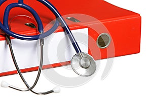 Blue stethoscope and red binder isolated on white