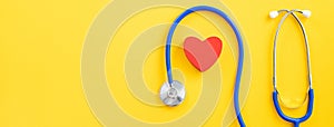 Blue stethoscope with red heart, medical care design concept