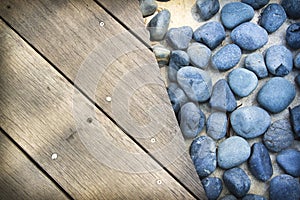 Blue stones wooden boards background