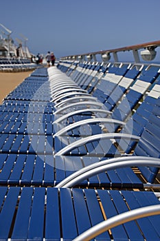 Blue Strap Chaise Lounges on Ships Deck