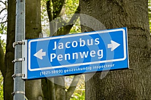 Blue street name sign of Jacobus Pennweg in Hilversum, Netherlands
