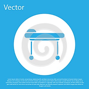 Blue Stretcher icon isolated on blue background. Patient hospital medical stretcher. White circle button. Vector