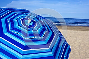 Blue striped beach umbrella