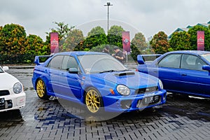 Blue Subaru Impreza WRX STI bugeye in JDM Fest 2023 parking lot