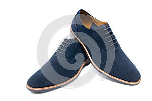 The blue suede shoes isolated on white background