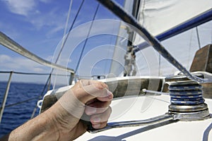 Blue summer water and sky in a sailboat