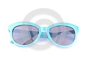 Blue sunglasses with dark glasses. Isolated