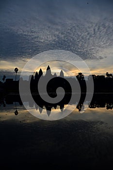 Blue sunrise at Angkor Wat Temple with reflection in Lake Siem Reap, Cambodia