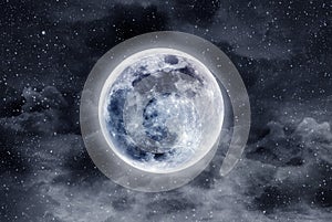 Blue Supermoon with stars and clouds photo
