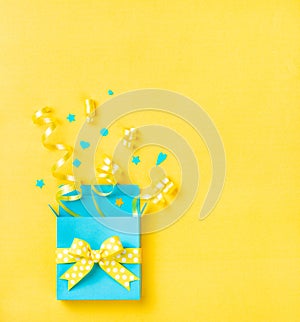 Blue Surprise gift box on Yellow