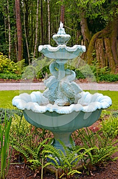 Blue swan sculpture water fountain