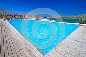 Blue swimming pool in Greece