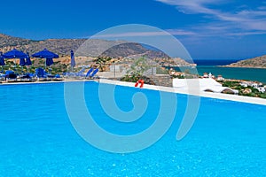 Blue swimming pool in Greece