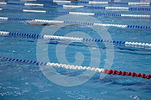 Blue swimming pool with lanes