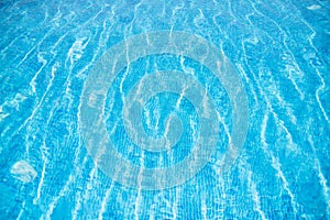 Blue swimming pool rippled water detail