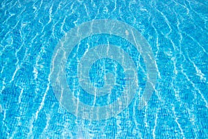 Blue swimming pool rippled water detail