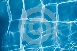 Blue swimming pool water background