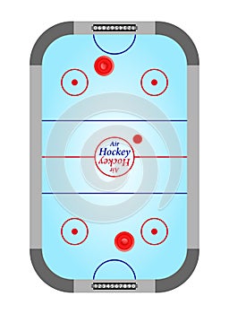 Blue table air hockey with rinks and gray with black counters of on the wicket blue hockey surface and the red and blue lines on a