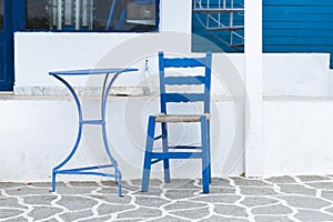 Blue Table and chair in the streets of Karpathos, Greece
