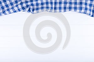 Blue table cloth on wooden