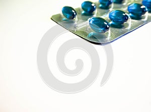 Blue tablets on a light background