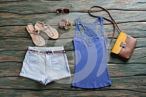 Blue tank top and shorts.